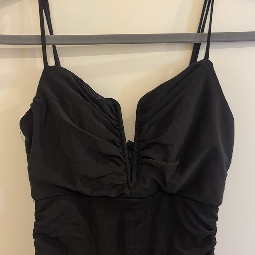 Black ruched mini dress, polyester and spandex.  NWT.